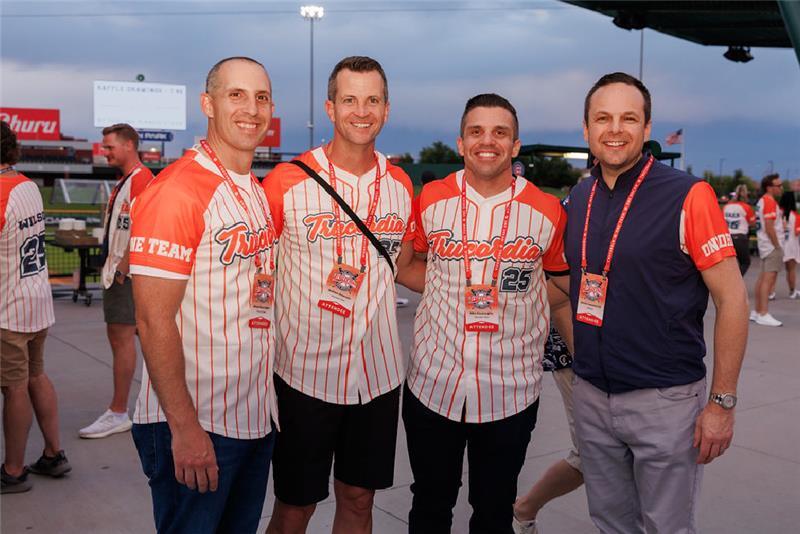 Employees at a baseball game